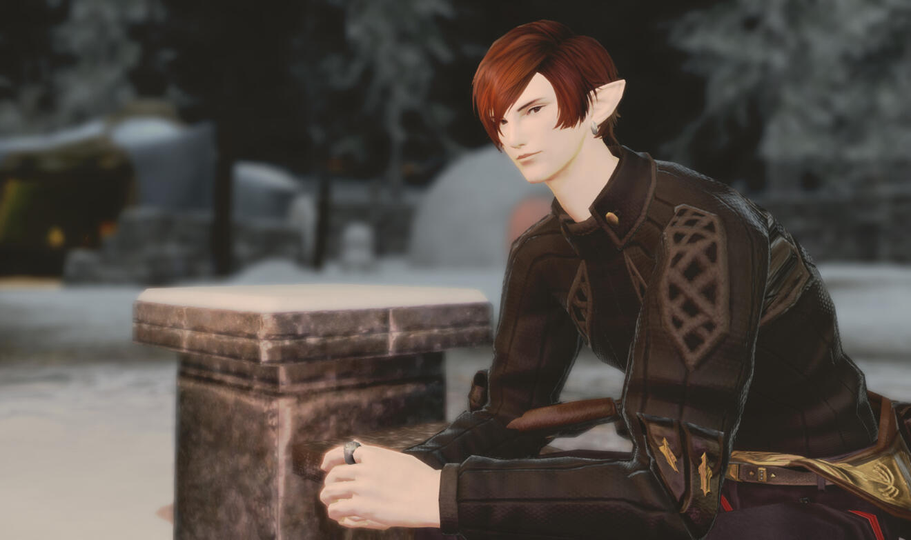 Remont on the left, sitting on a rock by a river, laughing with a bright yellow Chocobo on the right.